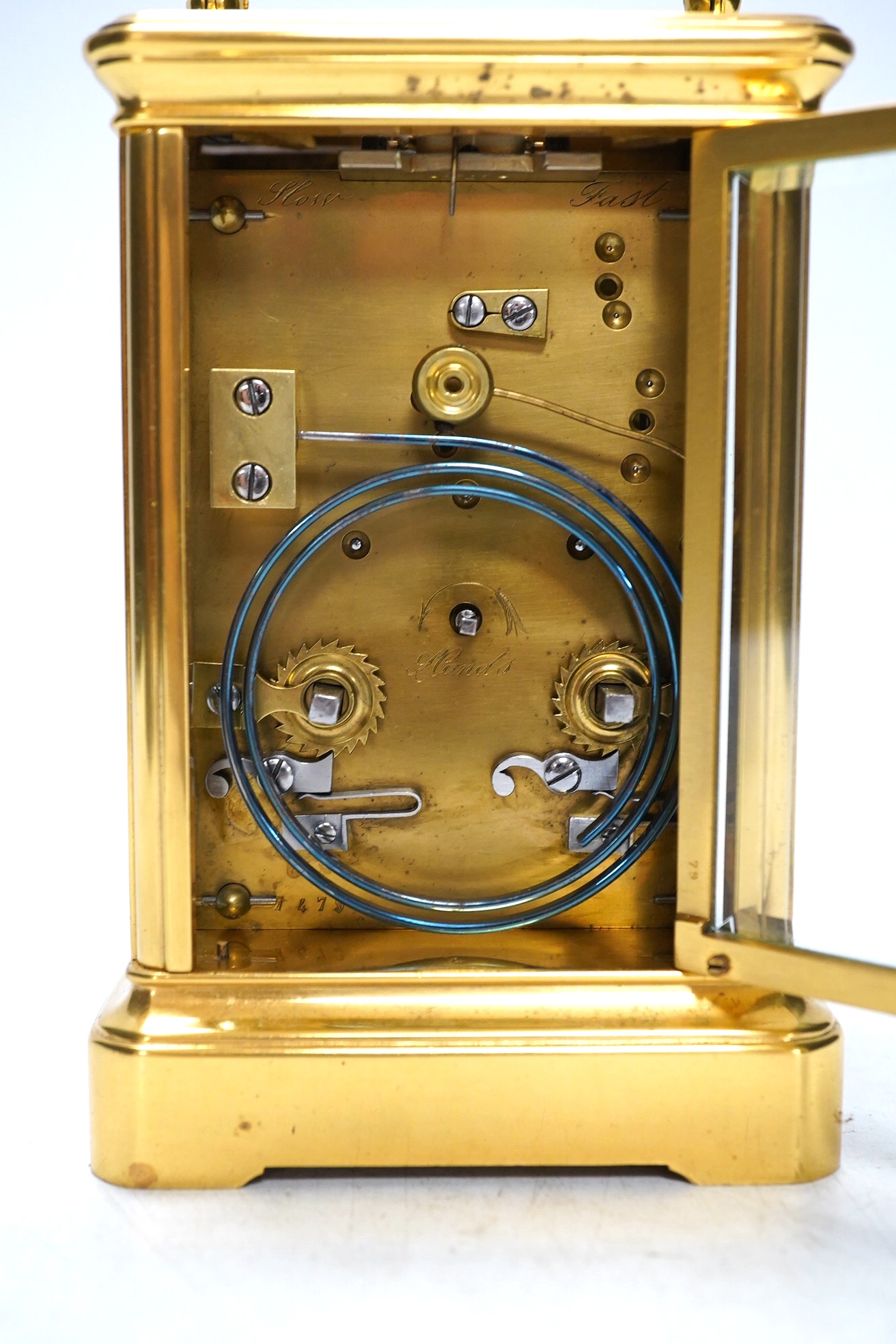 A cased unnamed brass carriage clock, 14cm tall. Condition - fair